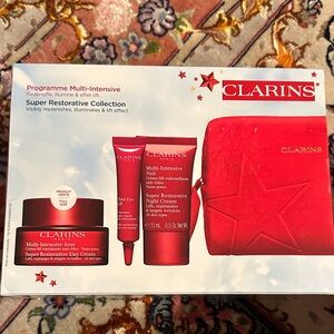 Clarins Super Restorative Skincare Trio with Red Pouch